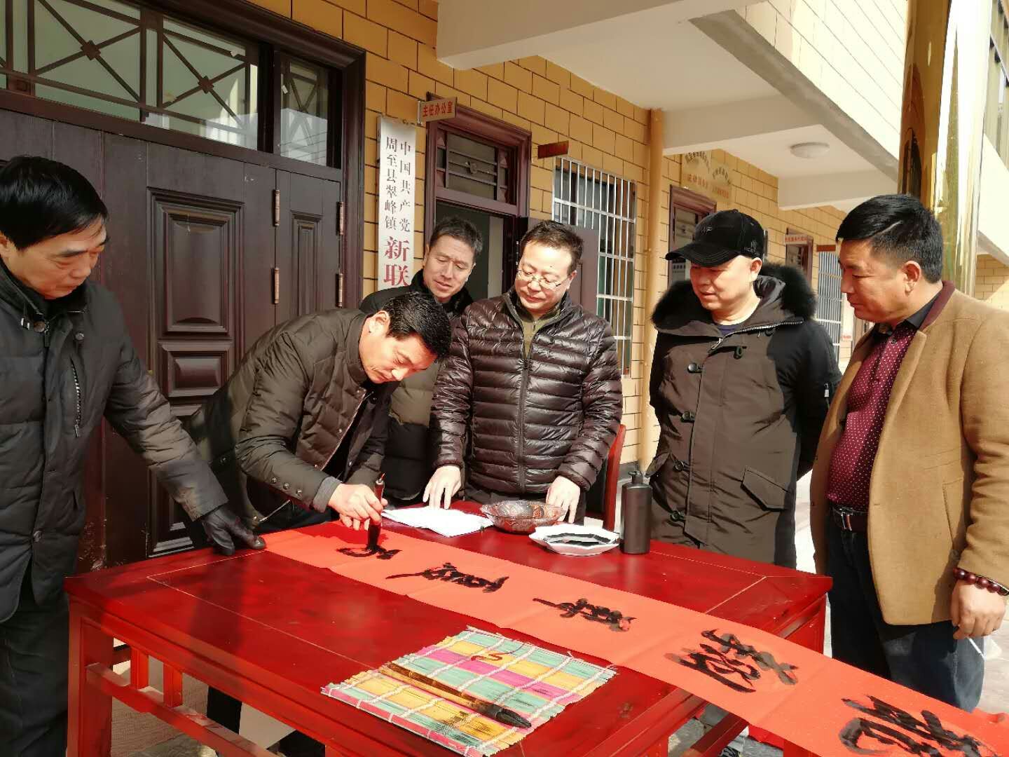 西安市残联春节前送春联到帮扶村和贫困户家庭